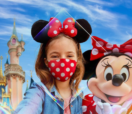 Little girl meeting Mickey Mouse at Disneyland Paris - stress-free luxury transportation from Paris airports with child seats provided