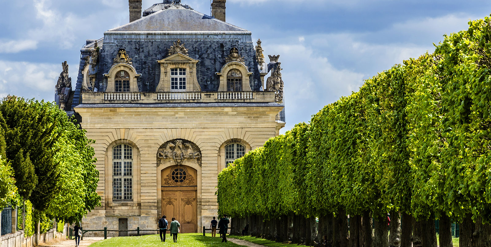 Chantilly estate aerial view - luxury door-to-door transportation from Paris with clean and well-maintained vehicles