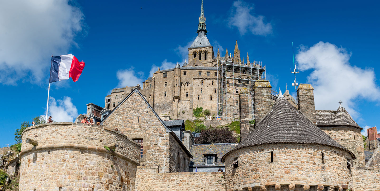 Medieval streets of Mont Saint-Michel - Easy Go Shuttle provides reliable transportation from Paris with English-speaking drivers