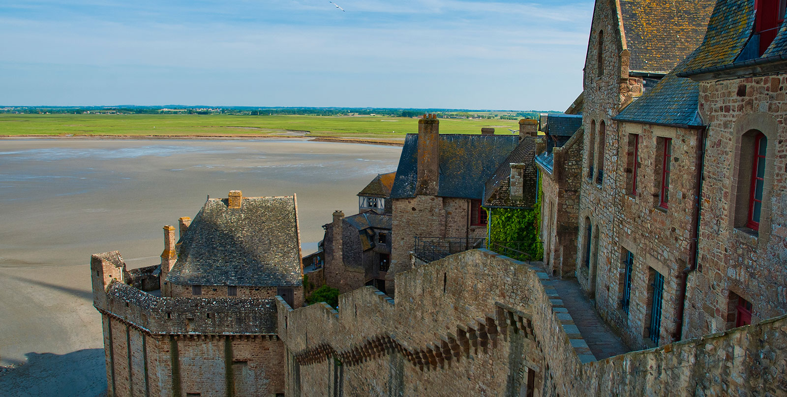 Mont Saint-Michel monastery interior - premium private car service for comfortable day trips from Paris