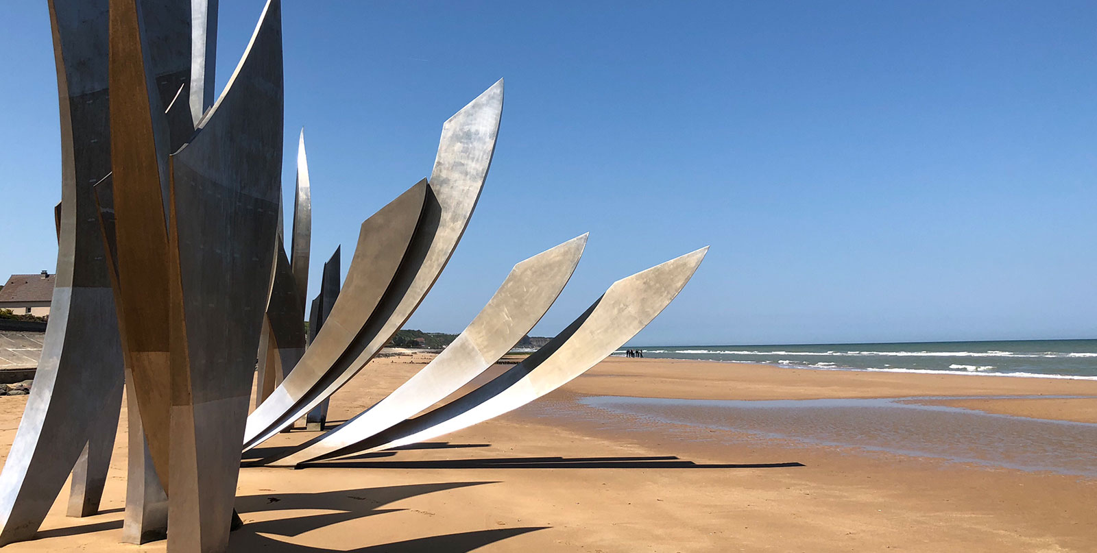 D-Day landing craft remains at Normandy beaches - private transfers from Paris with English-speaking drivers